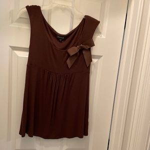 Bebe sleeveless top with bow, size M
